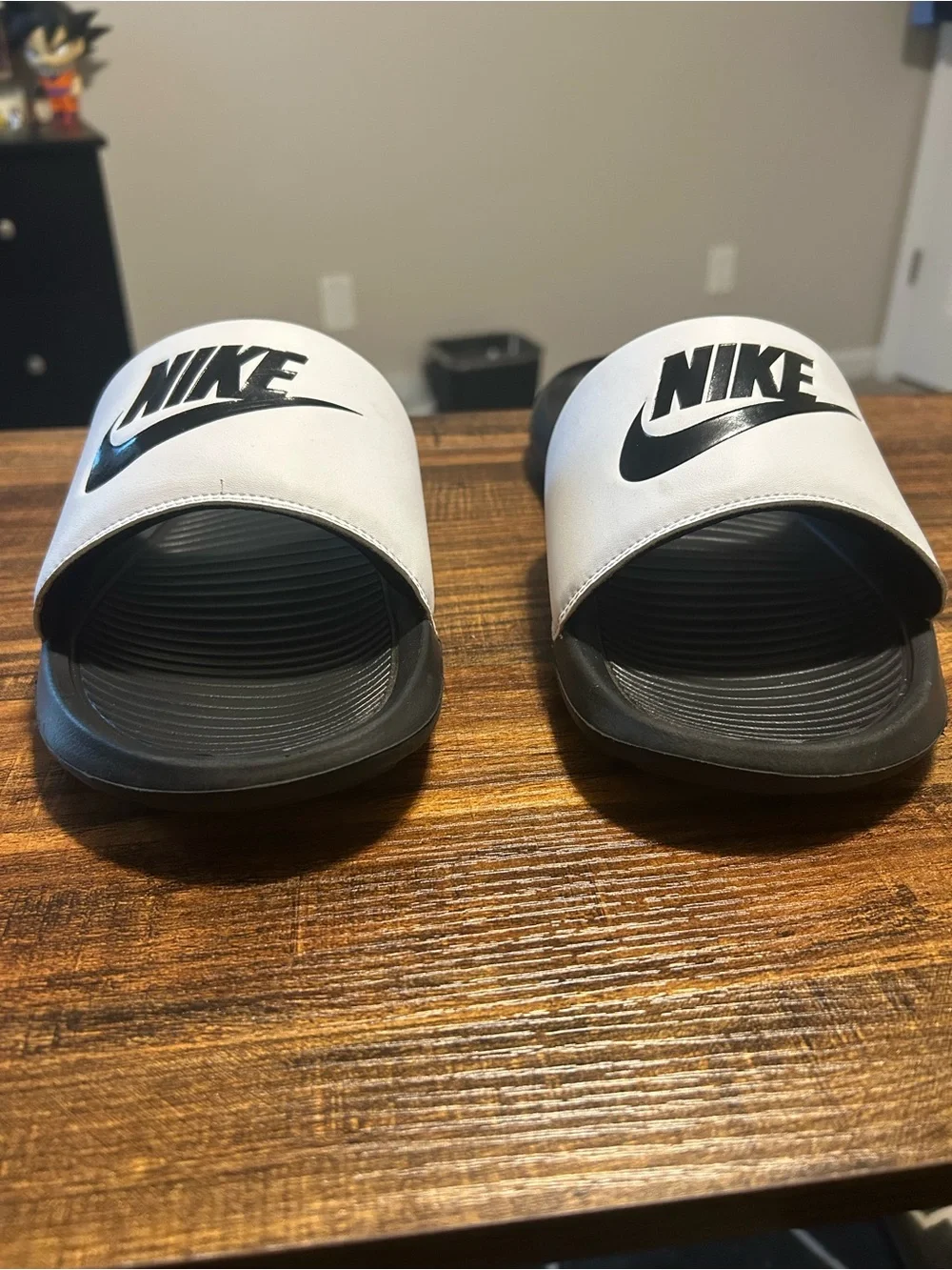Nike Black and White Slide Sandals with Logo Strap